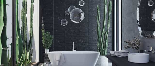 Moderne Badewanne in dunklem Badezimmer von Steinkühler